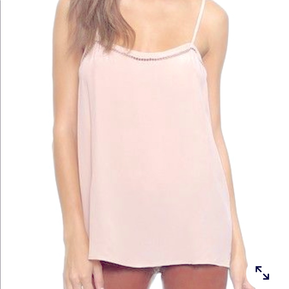 Equipment cara cami with feminine cutouts.